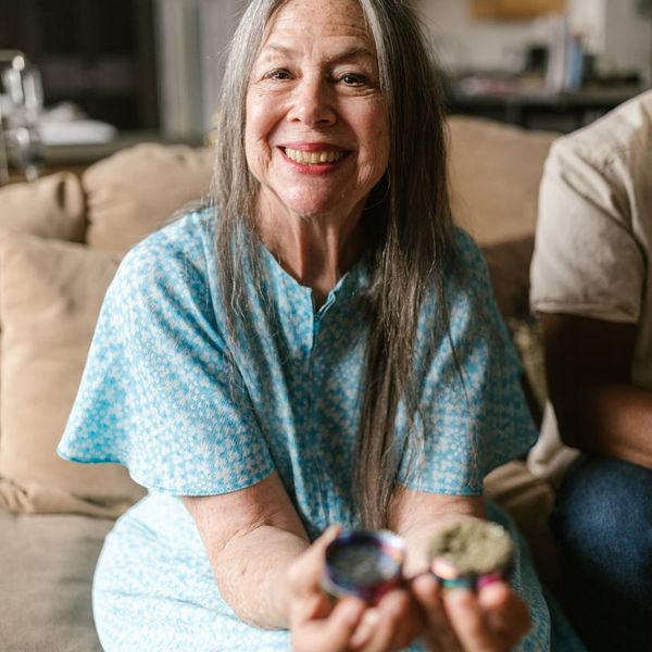 Smiling person relaxing in a comfortable home environment
